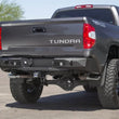 Load image into Gallery viewer, Addictive Desert Designs 2014+ Toyota Tundra Stealth Fighter Rear Bumper w/ Backup Sensor Cutouts - Additional View 6