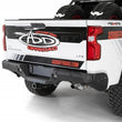 Load image into Gallery viewer, Addictive Desert Designs 2019-2020 Chevrolet Silverado 1500 Stealth Rear Bumper - Installation View