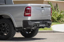 Load image into Gallery viewer, Addictive Desert Designs 2019 Ram 1500 Hammer Stealth Fighter Rear Bumper w/ 6 Sensor Cutouts - Main Product View