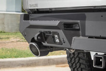 Load image into Gallery viewer, Addictive Desert Designs 2019 Ram 1500 Hammer Stealth Fighter Rear Bumper w/ 6 Sensor Cutouts - Installation View