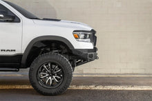 Load image into Gallery viewer, Addictive Desert Designs 2019 Ram Rebel 1500 Stealth Fighter Fr Bumper w/Parking Sensor Cutouts - Installation View