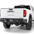 Load image into Gallery viewer, Addictive Desert Designs 2020 GM Sierra/Silverado 2500 Bomber HD Rear Bumper w/ Blind Spot Mounts - Installation View
