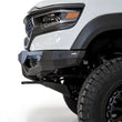 Load image into Gallery viewer, Addictive Desert Designs 2021 Dodge RAM 1500 TRX Bomber Front Bumper (Baja) - Installation View