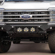 Load image into Gallery viewer, Addictive Desert Designs 2023+ Ford F-250/F-350 Bomber Front Bumper (w/ 3 Baja Designs LP6 Mounts) - Side View