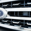 Load image into Gallery viewer, Addictive Desert Designs 2023+ Ford Super Duty Adaptive Cruise Control Relocation Bracket - Installation View