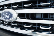 Load image into Gallery viewer, Addictive Desert Designs 2023+ Ford Super Duty Adaptive Cruise Control Relocation Bracket - Installation View
