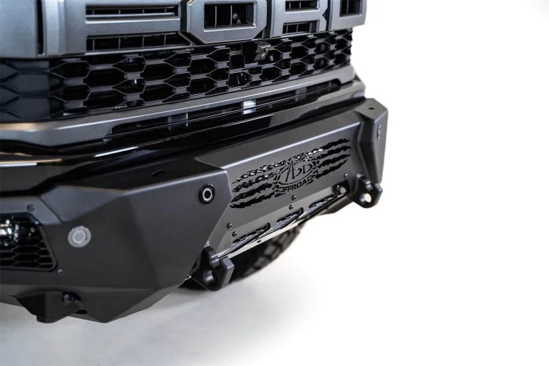 Addictive Desert Designs 21-22 Ford Raptor HoneyBadger Front Bumper - Side View