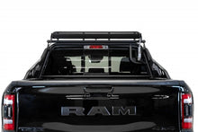 Load image into Gallery viewer, Addictive Desert Designs 21-22 RAM 1500 TRX Race Series Chase Rack w/ 2017 Grill Pattern - Installation View