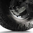 Load image into Gallery viewer, Addictive Desert Designs 21-25 RAM 1500 TRX/RHO Rear Shock Guards - Side View