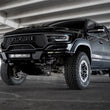 Load image into Gallery viewer, Addictive Desert Designs Front Bumper fits 2021-2023 Ram 1500 TRX - Side View
