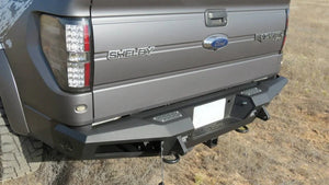 Addictive Desert Designs HoneyBadger Rear Bumper w/ Tow Hooks fits 2010-2014 Ford F-150 Raptor, F-150 SVT Raptor, F-150 FX...