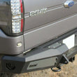 Load image into Gallery viewer, Addictive Desert Designs HoneyBadger Rear Bumper w/ Tow Hooks fits 2010-2014 Ford F-150 Raptor, F-150 SVT Raptor, F-150 FX...
