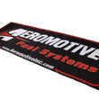 Load image into Gallery viewer, Aeromotive Banner - 32in x 92in (Black/Red) - Main Product View