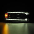 Load image into Gallery viewer, AlphaRex 02-05 Dodge Ram 1500 LUXX LED Proj Headlights Alpha Black w/Activ Light/Seq Signal - Side View
