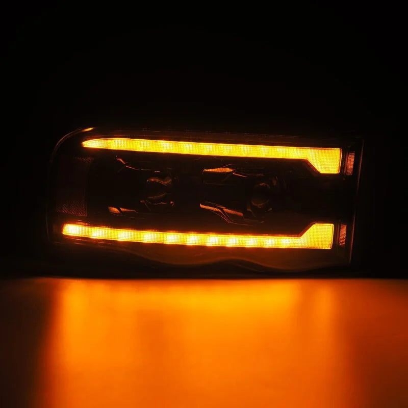 AlphaRex 02-05 Dodge Ram 1500 LUXX LED Proj Headlights Alpha Black w/Activ Light/Seq Signal - Back View