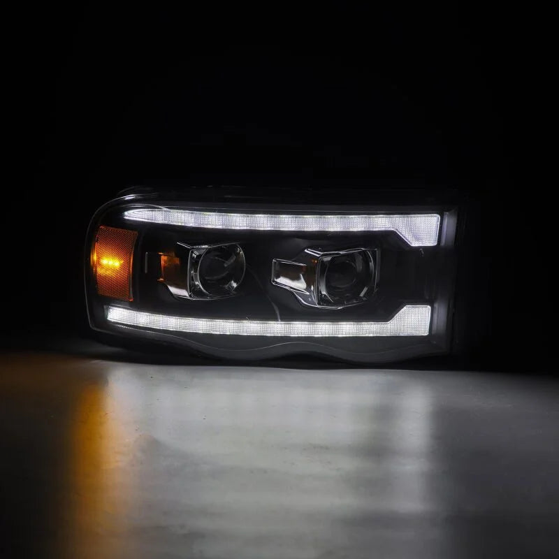 AlphaRex 02-05 Dodge Ram 1500 LUXX LED Proj Headlights Plank Style Black w/Activ Light/Seq Signal - Back View