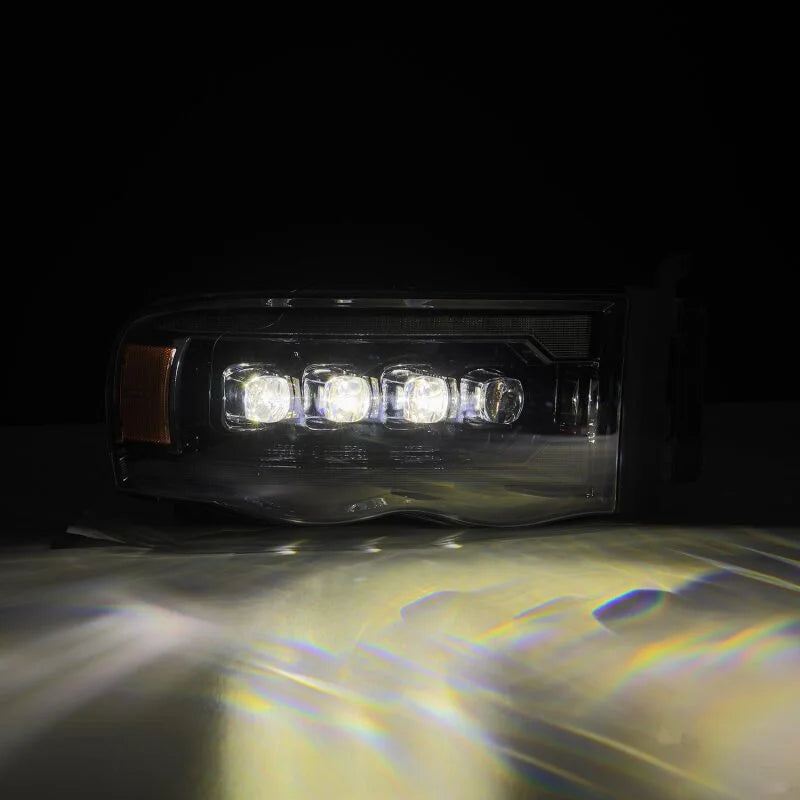 AlphaRex 02-05 Dodge Ram 1500 NOVA LED Proj Headlights Alpha Black w/Activ Light/Seq Signal - Back View