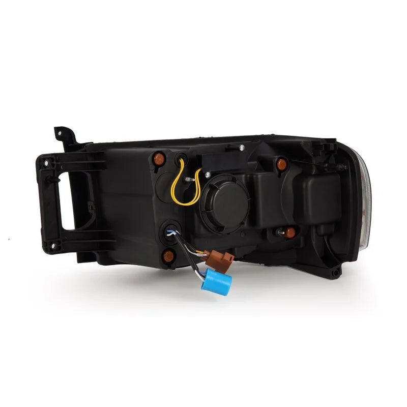 AlphaRex 02-05 Dodge Ram 1500 PRO-Series Projector Headlights Plank Style Black w/Seq Signal - Side View