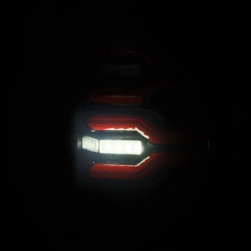 AlphaRex 02-06 Dodge Ram1500 + 03-06 Dodge Ram2500/3500 Luxx-Series LED Tail Lights (Pair) Black/Red - Installation View