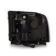 Load image into Gallery viewer, AlphaRex 05-07 Ford F250/350/450/550 Super Duty LUXX LED Proj HL Blk w/Actv Light &amp; Seq Sig + SB DRL - Back View