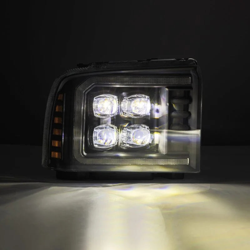 AlphaRex 05-07 Ford F250/350/450/550 Super Duty NOVA LED Proj HL Blk w/Actv Light & Seq Sig + SB DRL - Side View