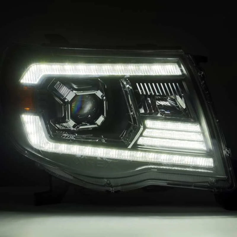 AlphaRex 05-11 Toyota Tacoma LUXX LED Projector Headlights Plank Style Alpha Black w/Activ Light/DRL - Side View