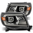Load image into Gallery viewer, AlphaRex 05-11 Toyota Tacoma PRO-Series Projector Headlights Plank Style Design Black w/DRL - Main Product View