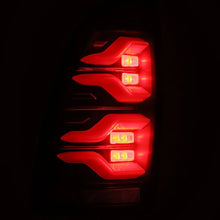 Load image into Gallery viewer, AlphaRex 05-15 Toyota Tacoma LUXX LED Taillights Blk w/Activ Light/Seq Signal - Side View