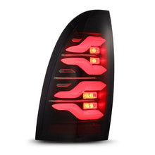 Load image into Gallery viewer, AlphaRex 05-15 Toyota Tacoma LUXX LED Taillights Blk w/Activ Light/Seq Signal - Back View