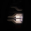 Load image into Gallery viewer, AlphaRex 05-15 Toyota Tacoma LUXX LED Taillights Blk w/Activ Light/Seq Signal - Installation View