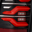 Load image into Gallery viewer, AlphaRex 05-15 Toyota Tacoma LUXX LED Taillights Blk/Red w/Activ Light/Seq Signal - Back View