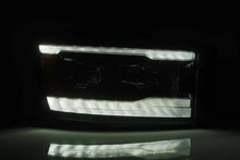 Load image into Gallery viewer, AlphaRex 06-08 Dodge Ram 1500HD LUXX LED Projector Headlights Plank Style Alpha Blk w/Seq Signal/DRL - Side View