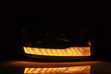 Load image into Gallery viewer, AlphaRex 06-08 Dodge Ram 1500HD LUXX LED Projector Headlights Plank Style Alpha Blk w/Seq Signal/DRL - Installation View