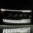 Load image into Gallery viewer, AlphaRex 06-08 Ram 1500HD NOVA LED Proj Headlights Plank Style Alpha Blk w/Seq Signal/DRL/Amber LED - Installation View