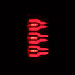 Load image into Gallery viewer, AlphaRex 07-08 Dodge Ram1500/07-09 Dodge Ram 2500+3500 Luxx-Series LED Tail Lights(Pair) Black/Red - Side View