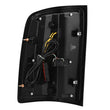 Load image into Gallery viewer, AlphaRex 07-13 GMC Sierra 1500/07-14 2500/3500HD (No Classic/Dually) Luxx-Series LED Tail Lights Blk - Back View