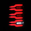 Load image into Gallery viewer, AlphaRex 07-13 GMC Sierra 1500/07-14 2500/3500HD (No Clsc/Dually) Luxx-Series LED Tail Lghts Blk Red - Back View