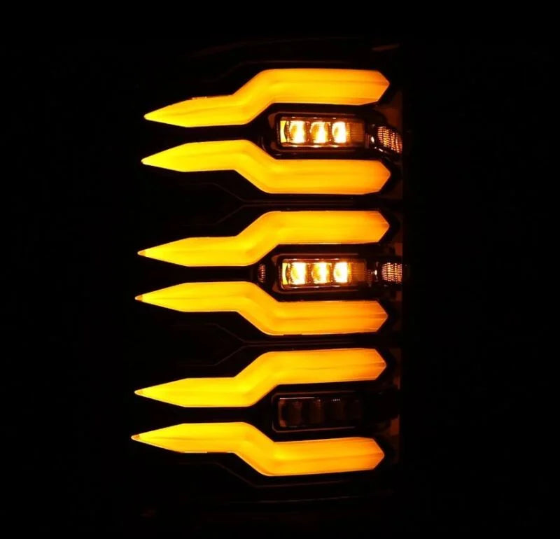 AlphaRex 07-13 GMC Sierra 1500/2500HD/3500HD Luxx Series LED Tail Lights - Alpha Black - Installation View