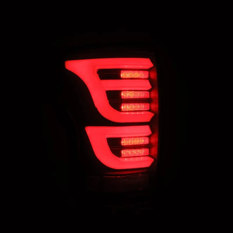 AlphaRex 07-13 Toyota Tundra LUXX-Series LED Tail Lights Black - Installation View