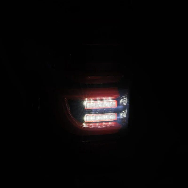 AlphaRex 07-13 Toyota Tundra LUXX-Series LED Tail Lights Black-Red - Side View