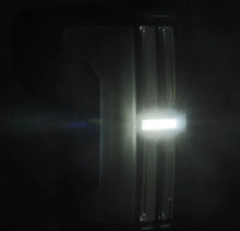 Load image into Gallery viewer, AlphaRex 07-13 Toyota Tundra Nova-Series LED Tail Lights - Black - Installation View