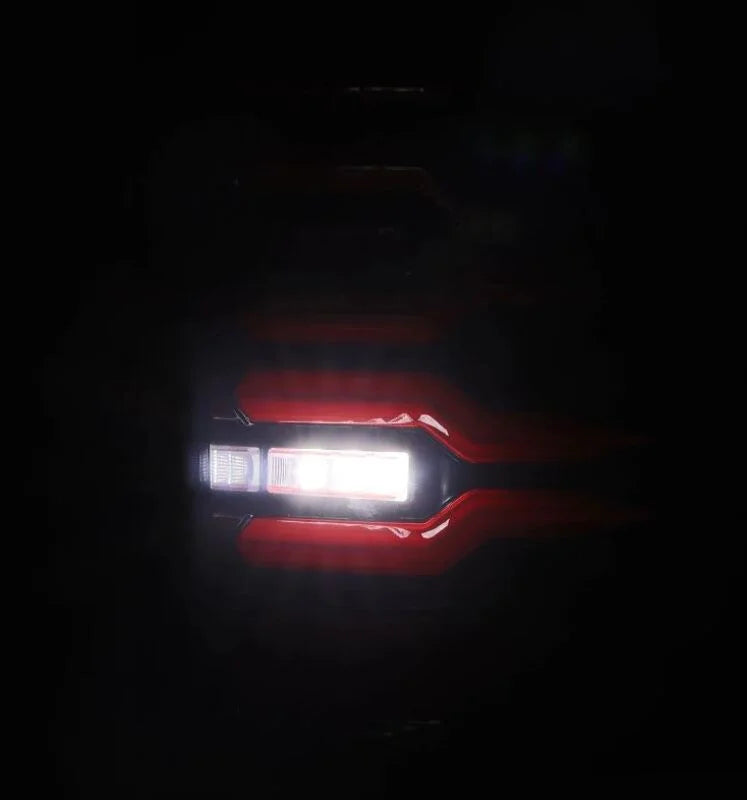AlphaRex 07-14 Chevrolet Silverado 1500/2500HD/3500HD Luxx-Series LED Tail Lights Black/Red - Side View