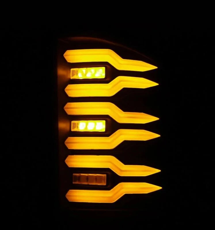 AlphaRex 07-14 Chevrolet Silverado 1500/2500HD/3500HD Luxx-Series LED Tail Lights Blk w/Smoked Lens - Side View