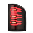 Load image into Gallery viewer, AlphaRex 07-14 Chevrolet Silverado 1500/2500HD/3500HD Luxx-Series LED Tail Lights Blk w/Smoked Lens - Additional View 5