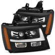 Load image into Gallery viewer, AlphaRex 07-14 Chevrolet Tahoe/Suburban LUXX-Series LED Projector headlights Black w/ DRL/Sequential - Main Product View