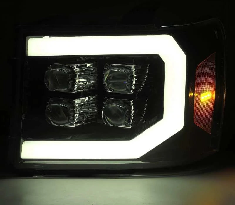 AlphaRex 07-14 GMC 2500HD NOVA LED Proj Headlight Plank Style Matte Blk w/Activ Light/Seq Signal/DRL - Installation View