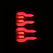 Load image into Gallery viewer, AlphaRex 09-18 Dodge RAM LUXX-Series LED Taillights Black Red w/Actv Light &amp; SS - Side View