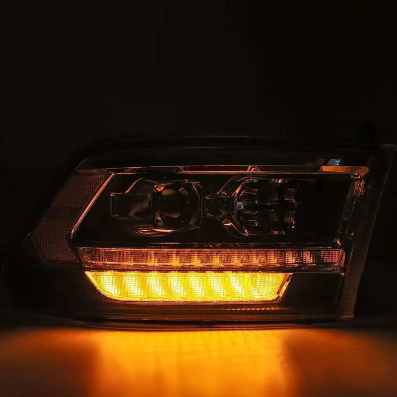 AlphaRex 09-18 Dodge Ram 1500HD PRO-Series Proj Headlight Plnk Style Blk w/Chrm Acc w/Seq Signal/DRL - Side View