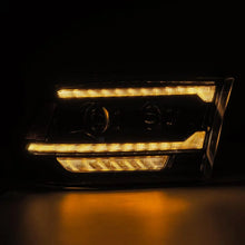 Load image into Gallery viewer, AlphaRex 09-18 RAM 1500 PRO-Series Proj Headlights Alpha-Black w/Sequential Signal &amp; Top/Middle DRL - Back View
