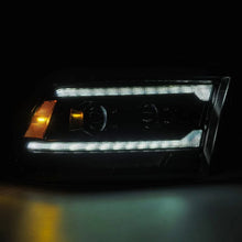 Load image into Gallery viewer, AlphaRex 09-18 RAM 1500 PRO-Series Proj Headlights Alpha-Black w/Sequential Signal &amp; Top/Middle DRL - Installation View